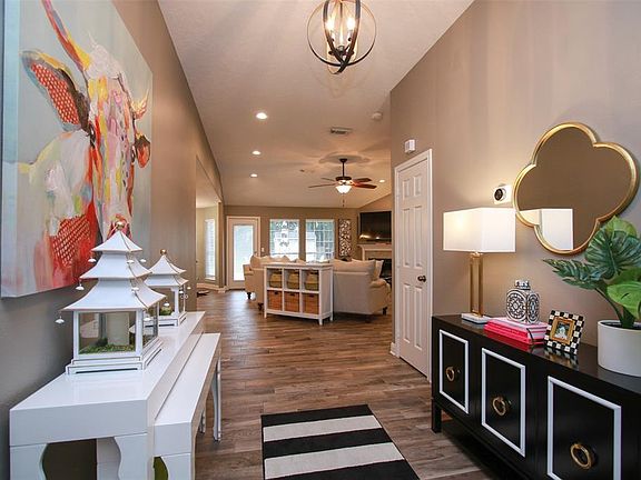 View from front door immediately greets you with the open and spacious living area.