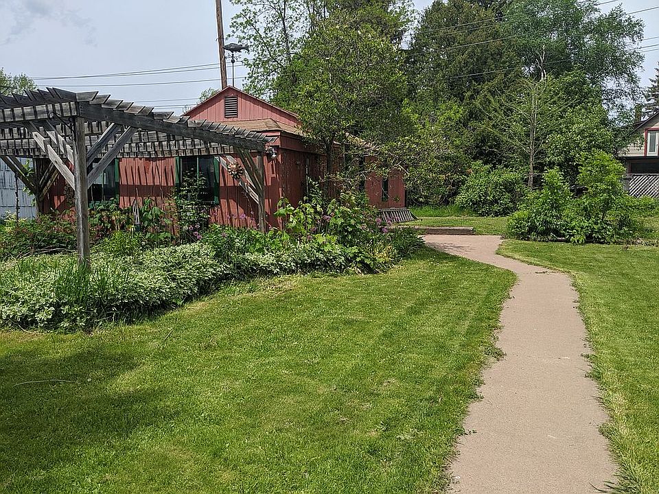 backyard view with pergola
