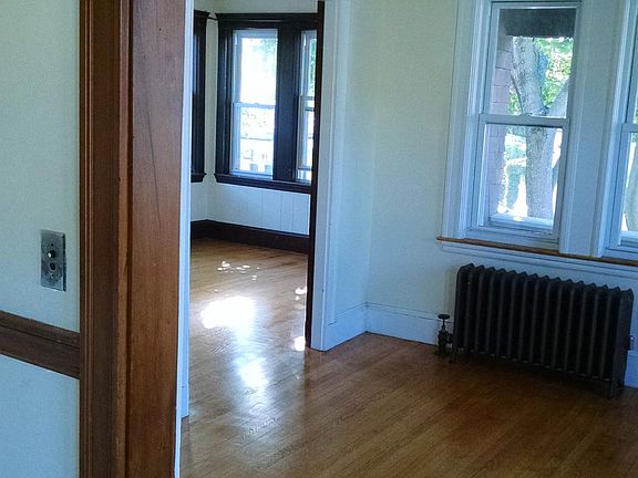 Looking from dining room to living room and sun room