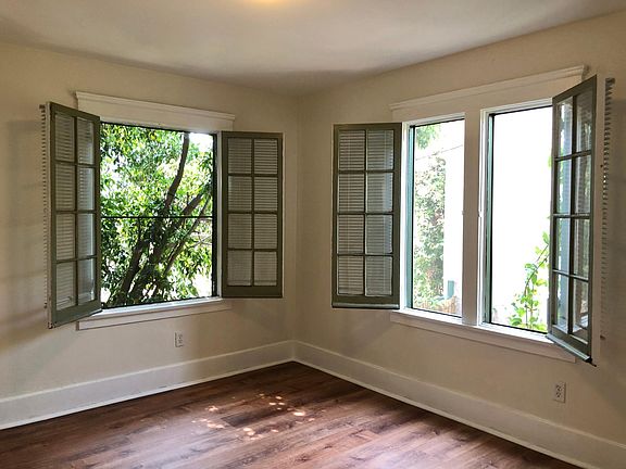 Bedroom with 2 sets of French Windows