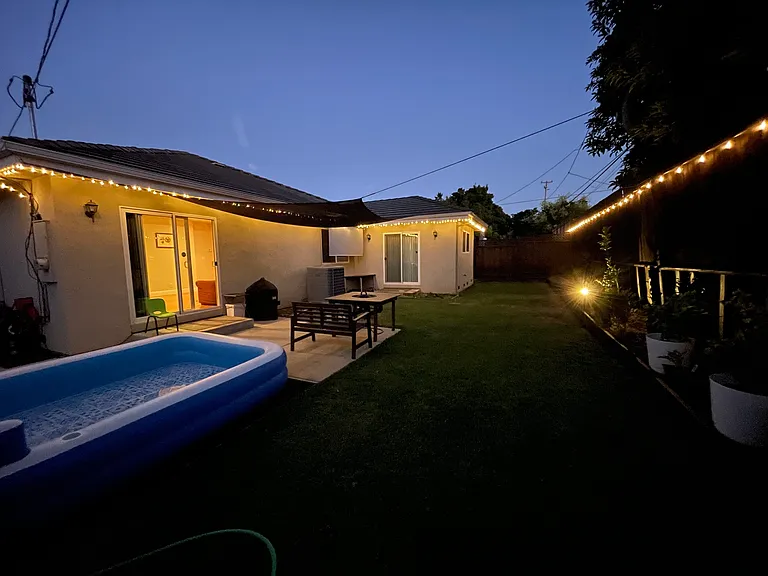 Backyard-A peaceful evening retreat, offering a quiet, beautifully lit escape to unwind at the end of the day.
