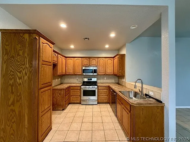 12169 N 107th East Pl — Photo 2