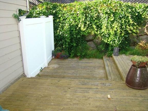 Private back yard with deck.