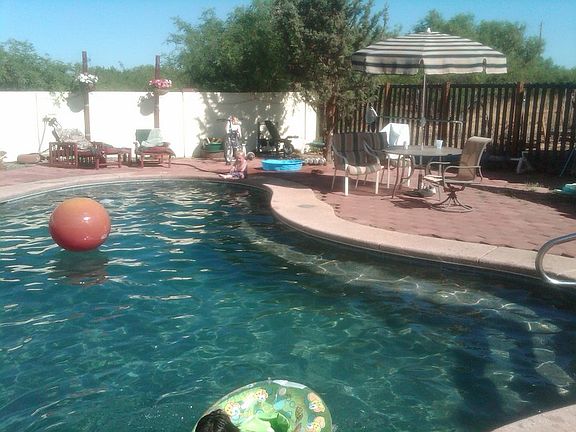 In-ground pool in backyard : Pool was installed in 2006 and features automatic pool cleaner.