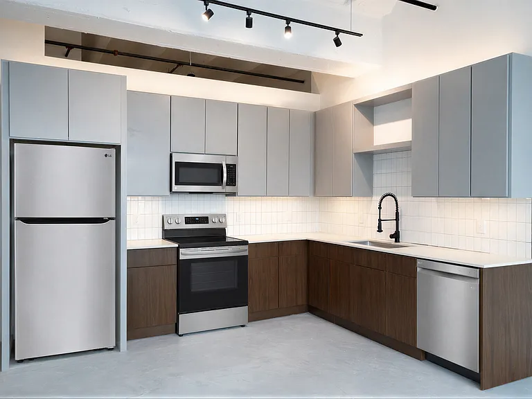 Contemporary Kitchen at Cole Motor Apartments in Indianapolis