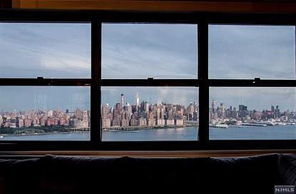 High floor direct NYC and Hudson River views with South East