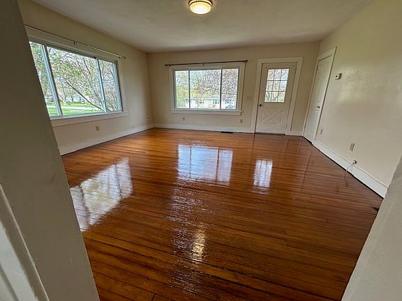 Large Living Room - refinished wood floor