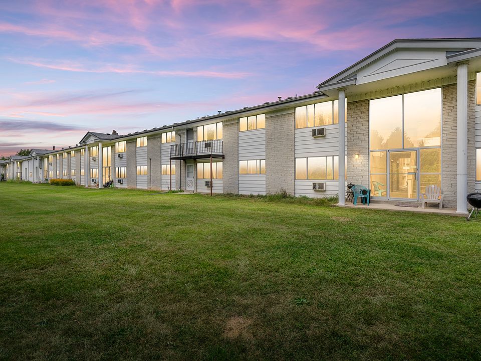 This apartment has a great green view of the big back yard.
