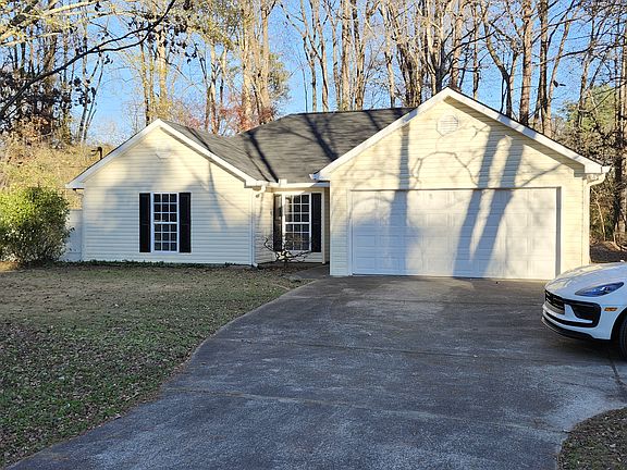 Large lot with house set back from the road.