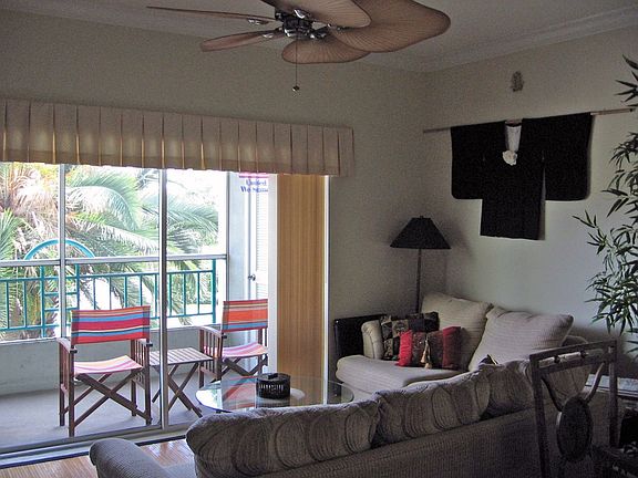 Living area opens to screened balcony