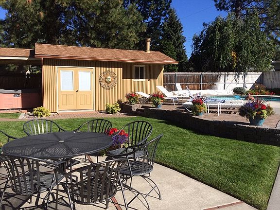 Back yard with pool house