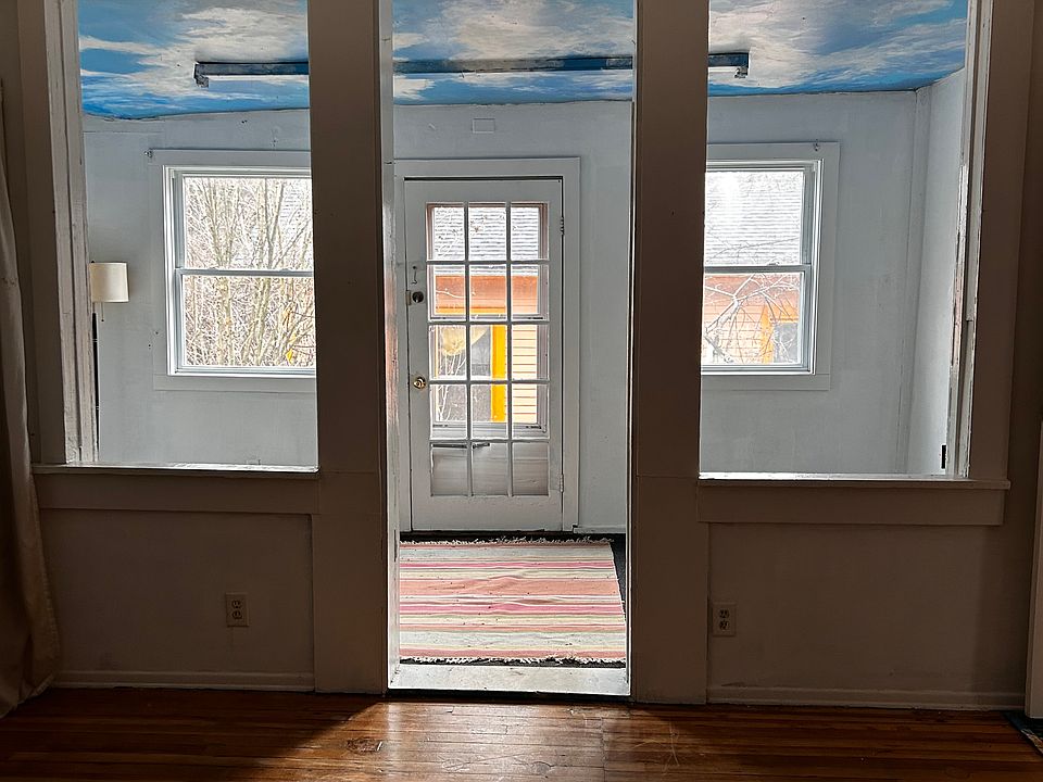 Looking south to entrance and sunroom