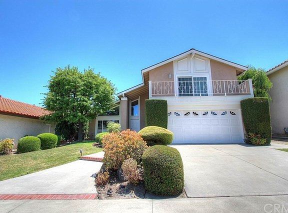 Beautifully landscaped home with great curb appeal, located in cul-de-sac.