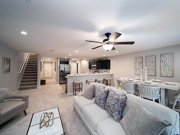 Enjoy an open living area - Azalea townhome in St. Cloud, FL