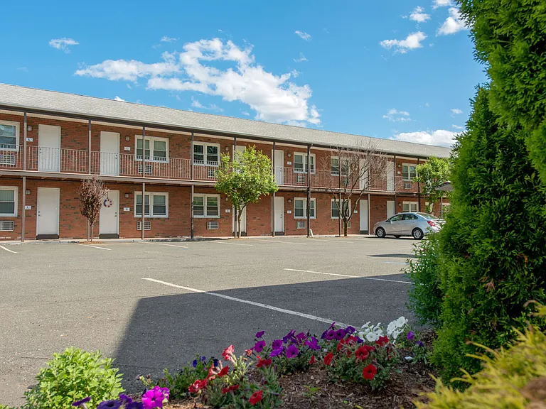 Experience the charm of private entries for each apartment, making your arrival home a comforting occasion.