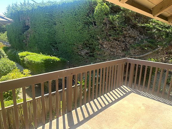 Balcony outside of Living Area. Very private and maintained gardens.