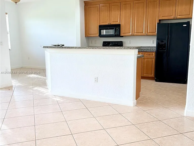 7993 NW 128th Ln #13-B — Photo 3
