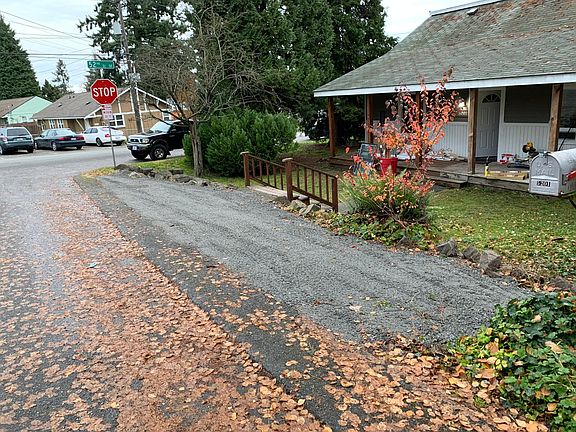 A Side parking strip and porch