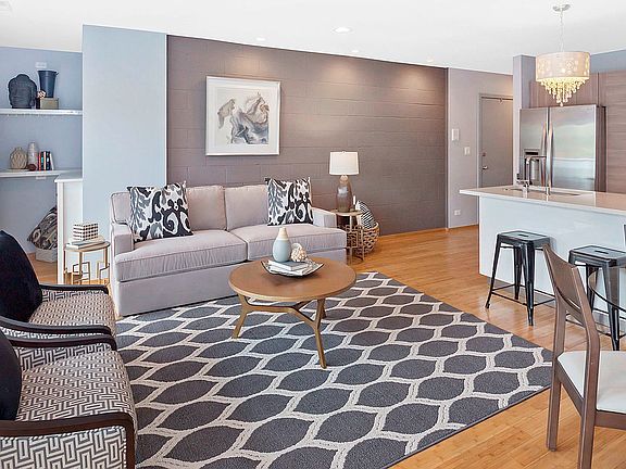 The open concept floor plan is perfect for entertaining and has bamboo hardwood floors throughout th