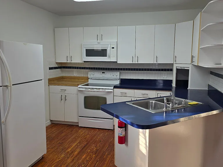 Full Kitchen With Dinette Area.