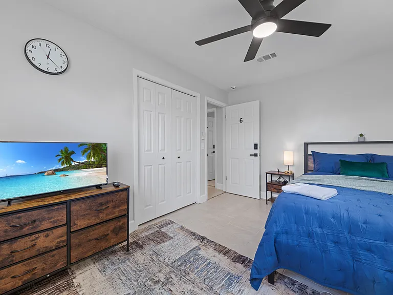TV on a solid wood dresser, smart lock on the door your private space, fully furnished.