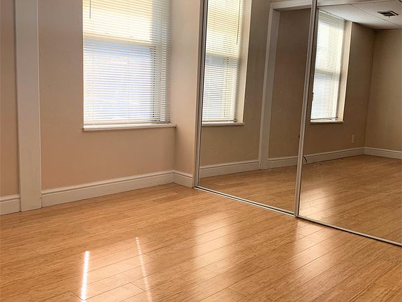 Newly installed hardwood flooring throughout