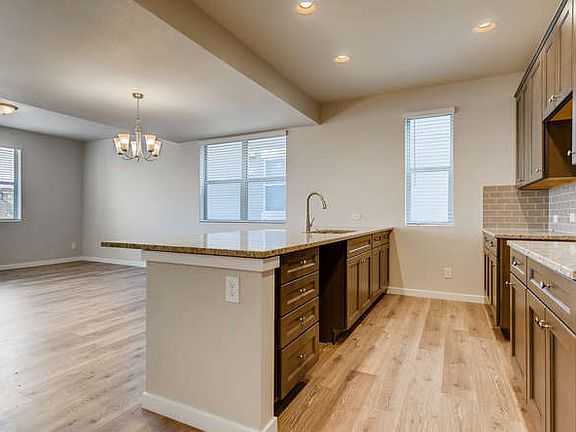 Stainless steel appliances (fridge, DW, range and microwave) are included but not pictured.