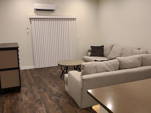 Great room with slider to patio (furniture not included)