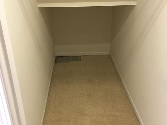 Entryway coat and storage closet