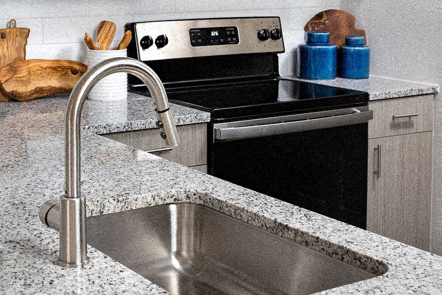 Granite countertops in kitchens and bathrooms
