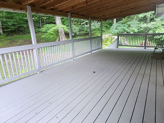 Large covered deck with plenty of room for a large dining table and lots of chairs!