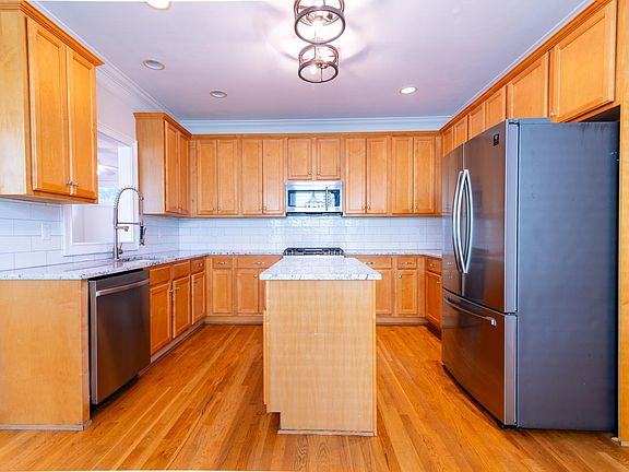 Enjoy this modern, spacious kitchen with ample cabinet space