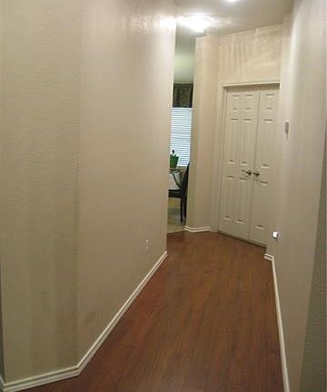 Hall leading to master bedroom and breakfast areas.