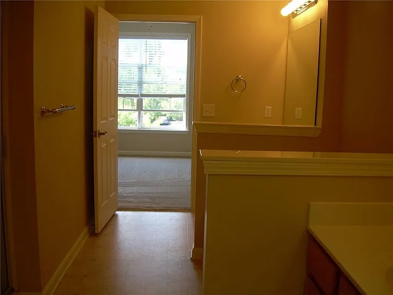 1975 Nocturne Drive
View from Master walk in closet thru Master bath to Master Bedroom