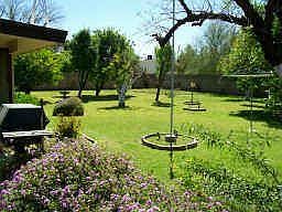 1/2 Acres Irrigated w/Mature fruit trees