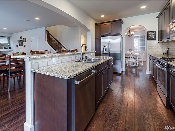 Gorgeous granite counters and subway tile backsplash