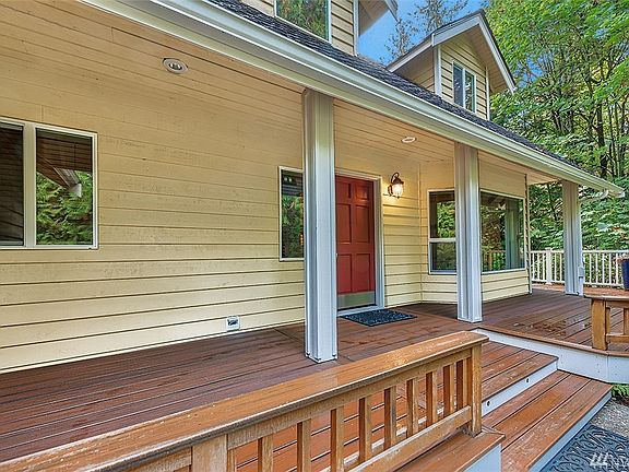 Enjoy sitting on the covered front porch or follow it as it wraps around to the back deck.