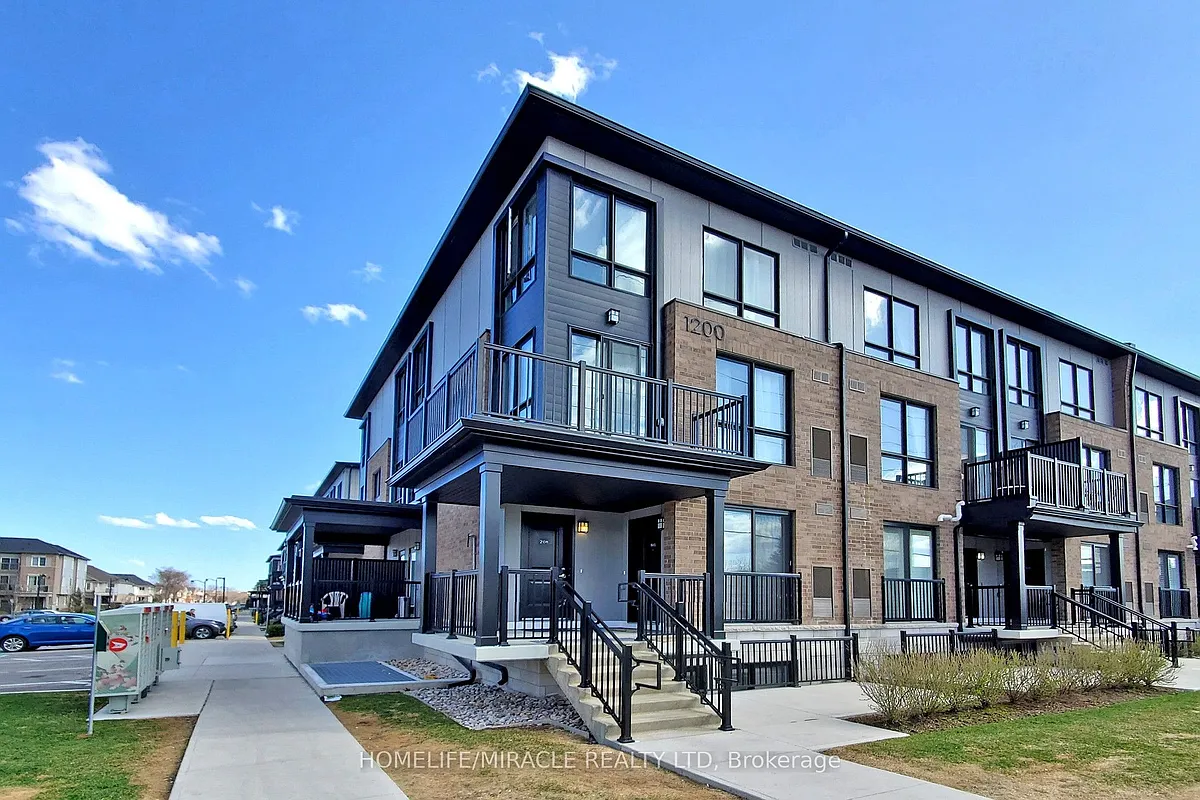 Building Photo - 1200 Main St E #107