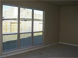 Master bedroom has elongated vinyl windows.. making this home quite energy effecient
