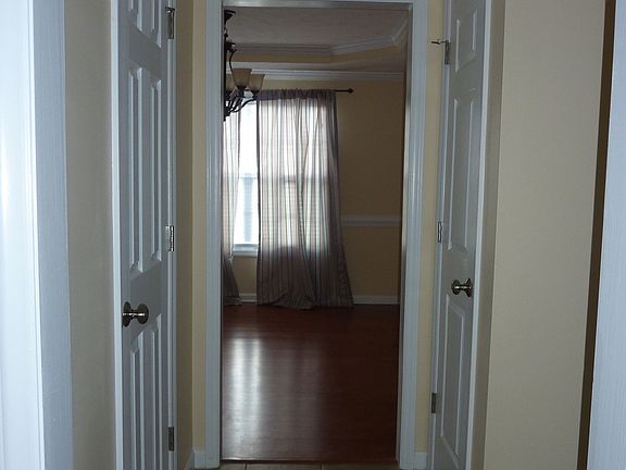 View from kitchen - half bath on left/pantry on right
