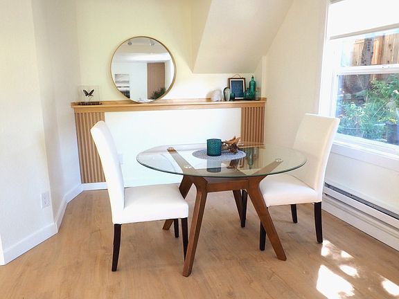 Open concept dining and living area promotes easy movement and social interaction