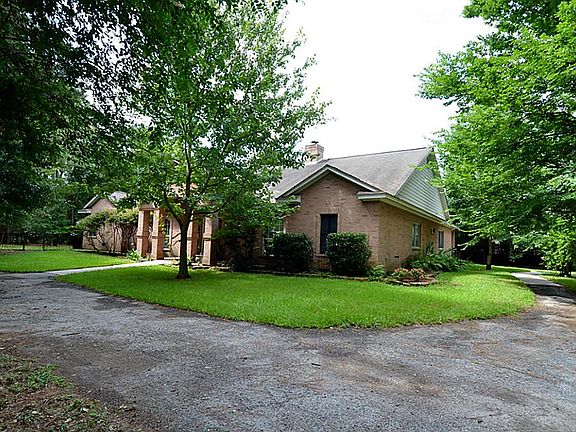 This home has a huge lot, wrap driveway with beautiful mature trees and tons of tranquility.