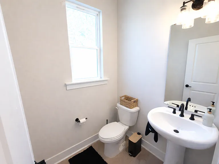 Convenient half bathroom on the main living floor