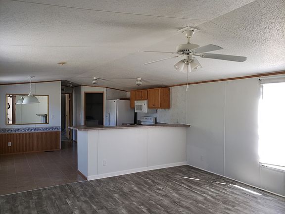Open Kitchen and Living room area with new flooring