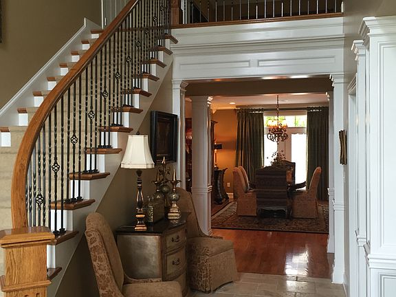 Two story foyer and stairway