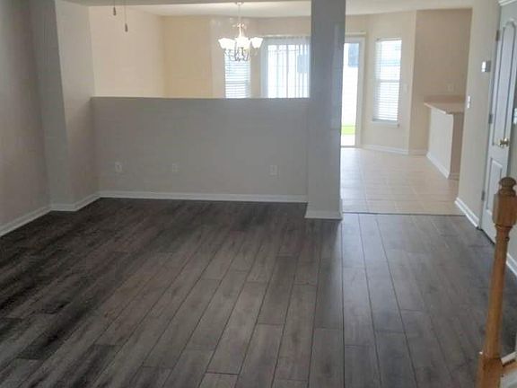 Living room from entry looking into dining area
