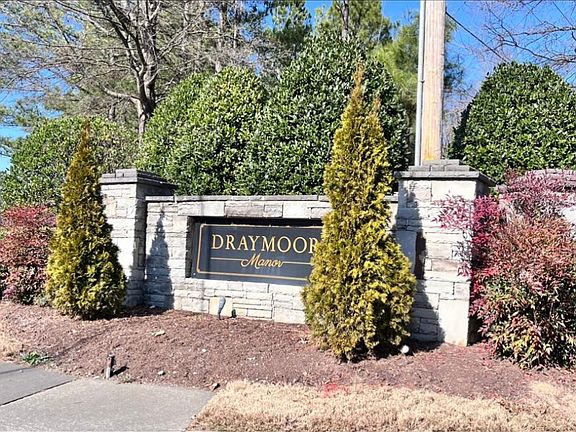 Gated community with remotes to open gate and guest code entry