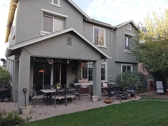 Beautiful Backyard and Grass with Trees Bushes /Rose Bushes and Flowers __