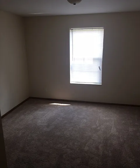 Bedroom with walk-in closet