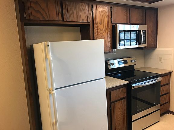Kitchen with New Microwave and Stove